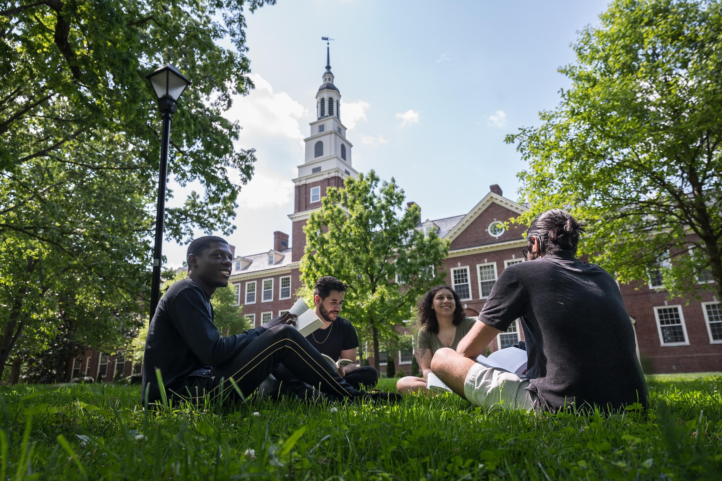Berea College students sit in front of the Draper building